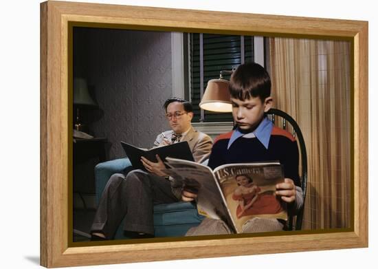 Father and Son Reading at Home-William P. Gottlieb-Framed Premier Image Canvas