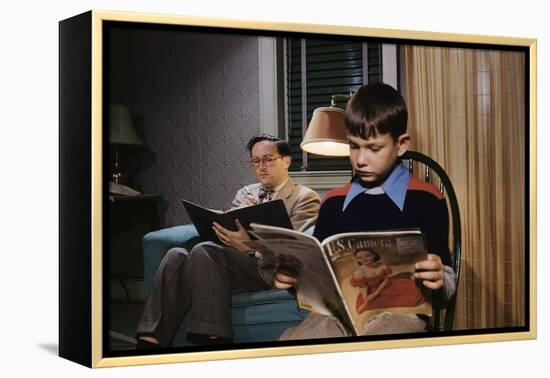 Father and Son Reading at Home-William P. Gottlieb-Framed Premier Image Canvas