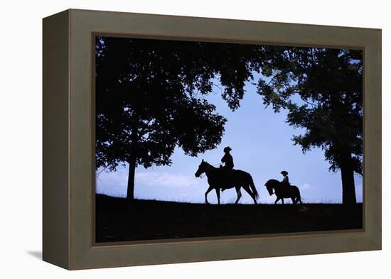 Father and Son Riding Horses-William P. Gottlieb-Framed Premier Image Canvas