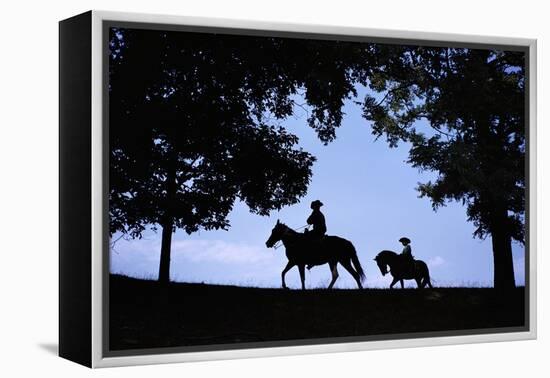 Father and Son Riding Horses-William P. Gottlieb-Framed Premier Image Canvas