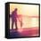 Father and Son Walking Out on a Dock at Sunset-soupstock-Framed Premier Image Canvas