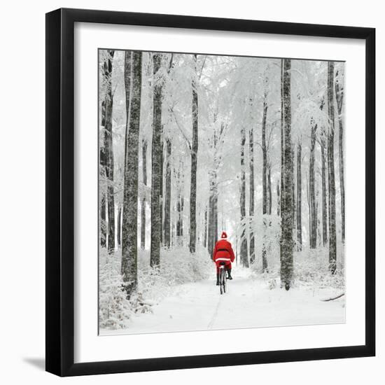 Father Christmas on a Bicycle in Snow-null-Framed Photographic Print