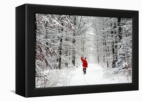 Father Christmas Riding Bicycle Through Beech-null-Framed Premier Image Canvas