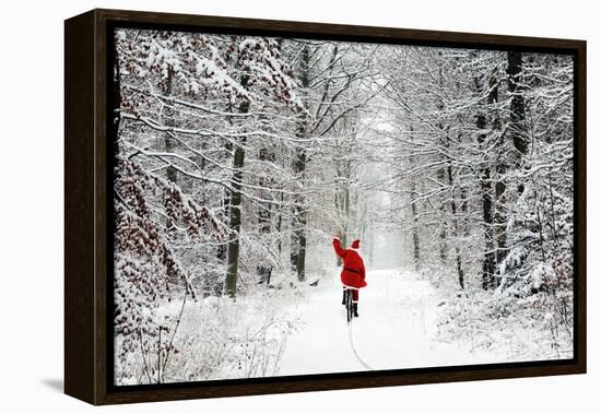 Father Christmas Riding Bicycle Through Beech-null-Framed Premier Image Canvas