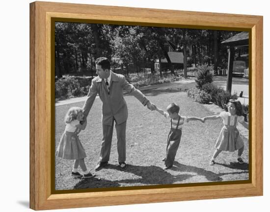 Father Playing in Yard with His Children-Wallace Kirkland-Framed Premier Image Canvas