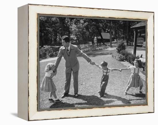 Father Playing in Yard with His Children-Wallace Kirkland-Framed Premier Image Canvas