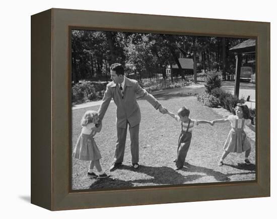 Father Playing in Yard with His Children-Wallace Kirkland-Framed Premier Image Canvas