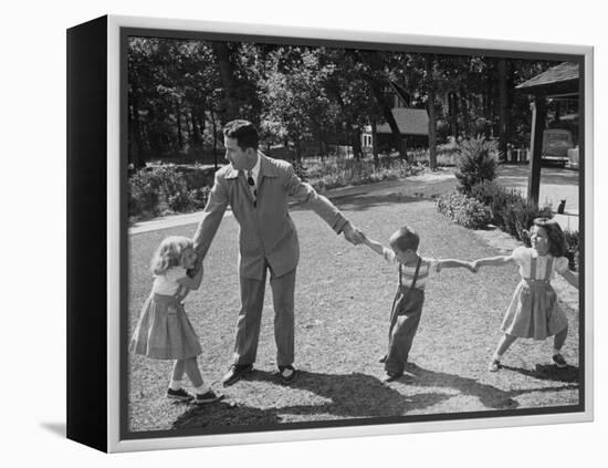 Father Playing in Yard with His Children-Wallace Kirkland-Framed Premier Image Canvas