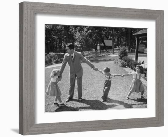 Father Playing in Yard with His Children-Wallace Kirkland-Framed Photographic Print