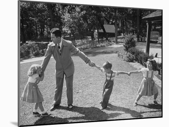 Father Playing in Yard with His Children-Wallace Kirkland-Mounted Photographic Print