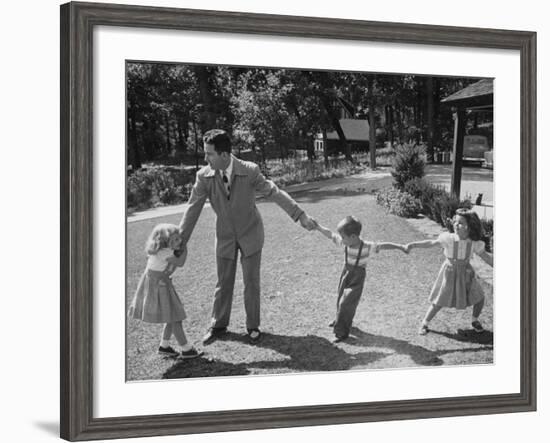 Father Playing in Yard with His Children-Wallace Kirkland-Framed Photographic Print