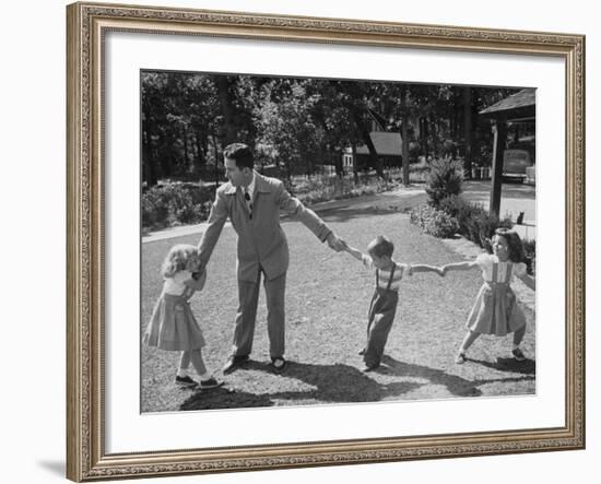 Father Playing in Yard with His Children-Wallace Kirkland-Framed Photographic Print