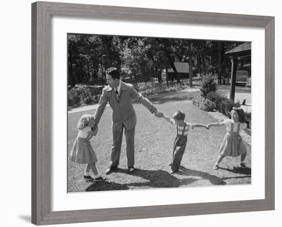 Father Playing in Yard with His Children-Wallace Kirkland-Framed Photographic Print