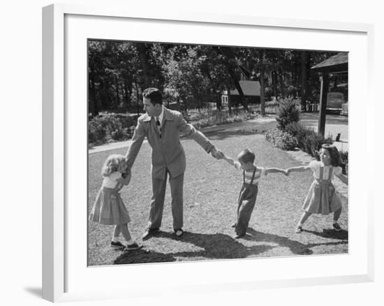 Father Playing in Yard with His Children-Wallace Kirkland-Framed Photographic Print