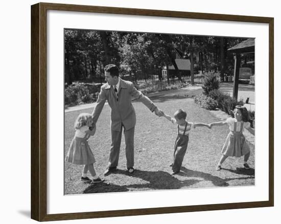 Father Playing in Yard with His Children-Wallace Kirkland-Framed Photographic Print