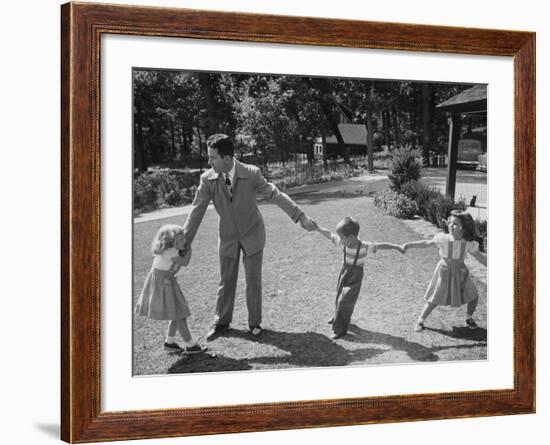 Father Playing in Yard with His Children-Wallace Kirkland-Framed Photographic Print