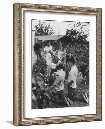 Father Thomas Mccullough Holding Religious Service for Migrant Mexican Farm Laborers in a Work Camp-null-Framed Photographic Print