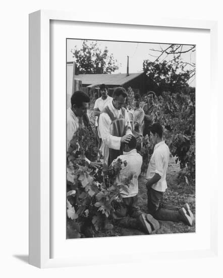 Father Thomas Mccullough Holding Religious Service for Migrant Mexican Farm Laborers in a Work Camp-null-Framed Photographic Print