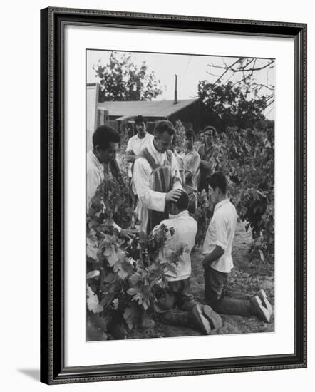 Father Thomas Mccullough Holding Religious Service for Migrant Mexican Farm Laborers in a Work Camp-null-Framed Photographic Print