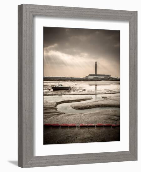 Fawley power station, a boat and a creek meandering through the mudflats all lit by a broken sky, H-Matthew Cattell-Framed Photographic Print