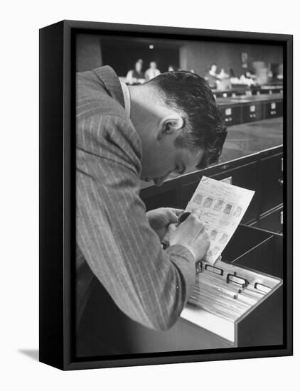FBI Agent Examining Fingerprints-George Skadding-Framed Premier Image Canvas