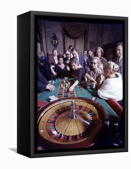 February 11, 1957: Tourists Gambling at the Nacional Hotel in Havana, Cuba-Ralph Morse-Framed Premier Image Canvas