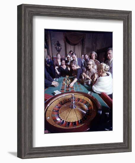 February 11, 1957: Tourists Gambling at the Nacional Hotel in Havana, Cuba-Ralph Morse-Framed Photographic Print