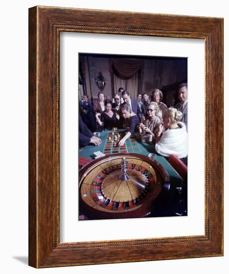 February 11, 1957: Tourists Gambling at the Nacional Hotel in Havana, Cuba-Ralph Morse-Framed Photographic Print