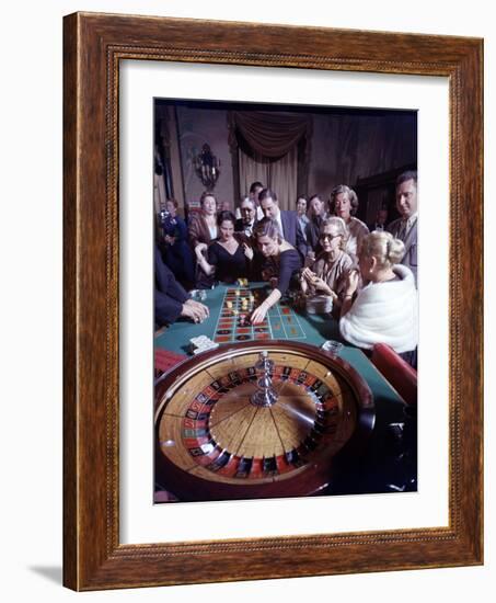 February 11, 1957: Tourists Gambling at the Nacional Hotel in Havana, Cuba-Ralph Morse-Framed Photographic Print