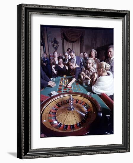 February 11, 1957: Tourists Gambling at the Nacional Hotel in Havana, Cuba-Ralph Morse-Framed Photographic Print