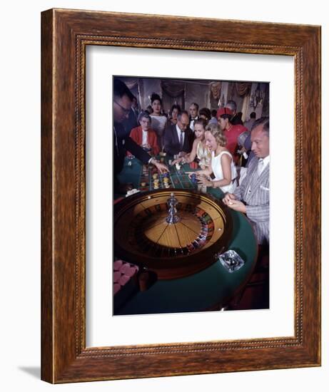 February 11, 1957: Tourists Gambling at the Nacional Hotel in Havana, Cuba-Ralph Morse-Framed Photographic Print