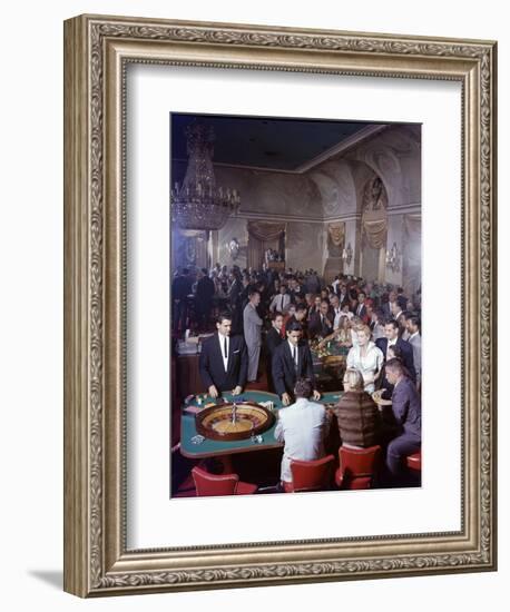 February 11, 1957: Tourists Gambling at the Nacional Hotel in Havana, Cuba-Ralph Morse-Framed Photographic Print