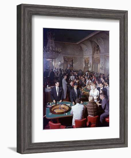 February 11, 1957: Tourists Gambling at the Nacional Hotel in Havana, Cuba-Ralph Morse-Framed Photographic Print