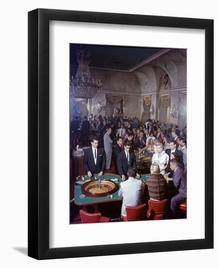 February 11, 1957: Tourists Gambling at the Nacional Hotel in Havana, Cuba-Ralph Morse-Framed Photographic Print