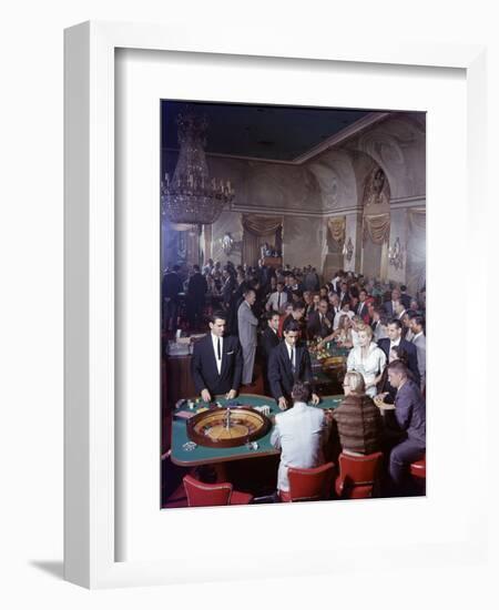 February 11, 1957: Tourists Gambling at the Nacional Hotel in Havana, Cuba-Ralph Morse-Framed Photographic Print