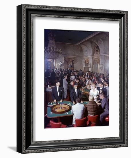 February 11, 1957: Tourists Gambling at the Nacional Hotel in Havana, Cuba-Ralph Morse-Framed Photographic Print