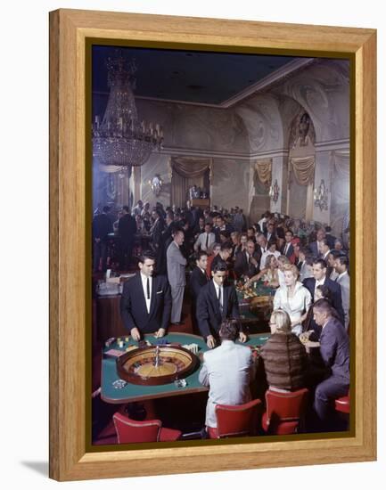 February 11, 1957: Tourists Gambling at the Nacional Hotel in Havana, Cuba-Ralph Morse-Framed Premier Image Canvas