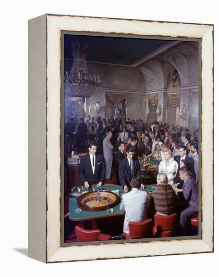 February 11, 1957: Tourists Gambling at the Nacional Hotel in Havana, Cuba-Ralph Morse-Framed Premier Image Canvas