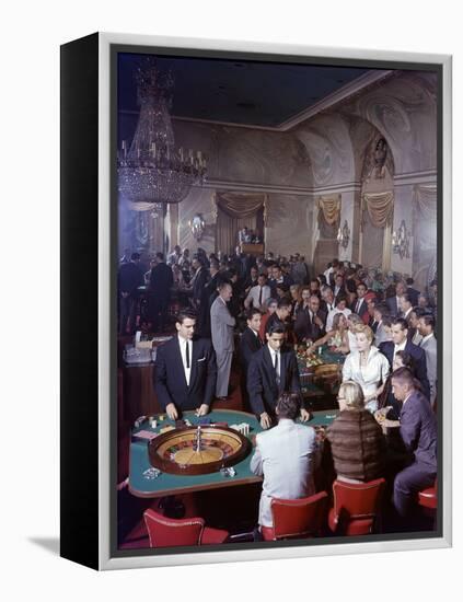February 11, 1957: Tourists Gambling at the Nacional Hotel in Havana, Cuba-Ralph Morse-Framed Premier Image Canvas