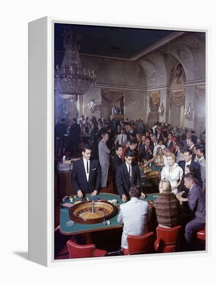 February 11, 1957: Tourists Gambling at the Nacional Hotel in Havana, Cuba-Ralph Morse-Framed Premier Image Canvas