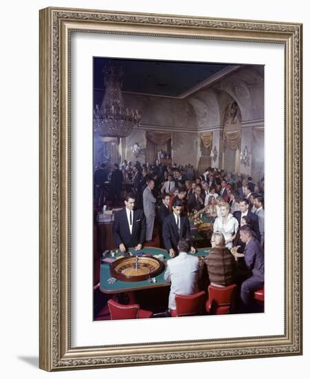 February 11, 1957: Tourists Gambling at the Nacional Hotel in Havana, Cuba-Ralph Morse-Framed Photographic Print
