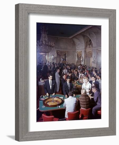 February 11, 1957: Tourists Gambling at the Nacional Hotel in Havana, Cuba-Ralph Morse-Framed Photographic Print