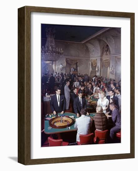 February 11, 1957: Tourists Gambling at the Nacional Hotel in Havana, Cuba-Ralph Morse-Framed Photographic Print