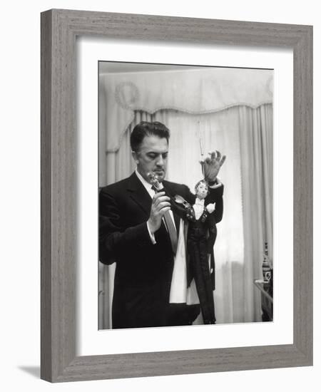 Federico Fellini and the Marionette, Rome 1960-Angelo Cozzi-Framed Photographic Print