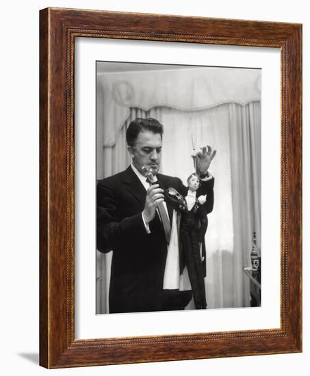 Federico Fellini and the Marionette, Rome 1960-Angelo Cozzi-Framed Photographic Print