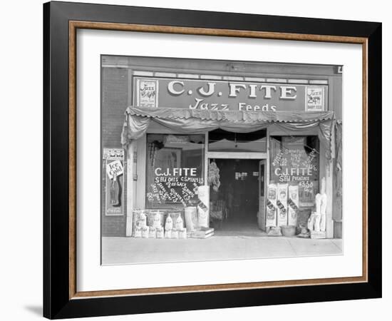 Feed store front, Alabama, 1936-Walker Evans-Framed Photographic Print