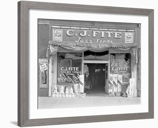 Feed store front, Alabama, 1936-Walker Evans-Framed Photographic Print