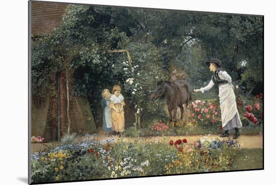 Feeding a Pony in a Surrey Garden-Edward Killingworth Johnson-Mounted Giclee Print