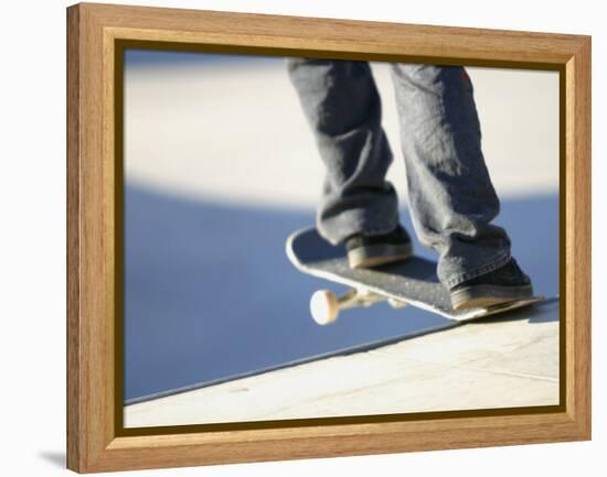 Feet on a Skateboard at the Edge of a Ramp-null-Framed Premier Image Canvas