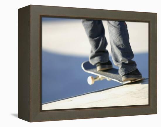 Feet on a Skateboard at the Edge of a Ramp-null-Framed Premier Image Canvas